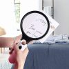 handheld magnifying glass